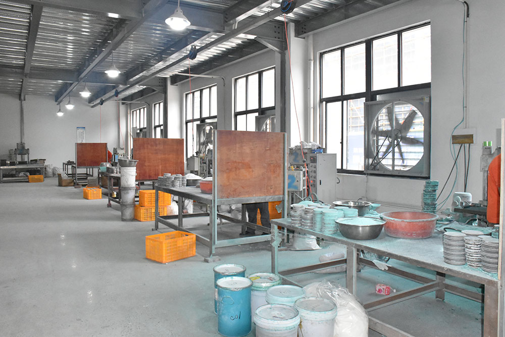 Industrial machinery for stone abrasive manufacturing